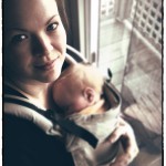 Baby in Manduca Vollschnallentrage