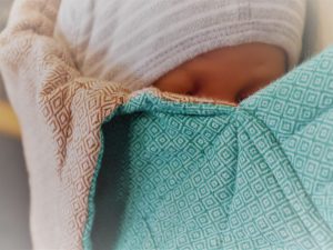 Baby in Mysol Trage